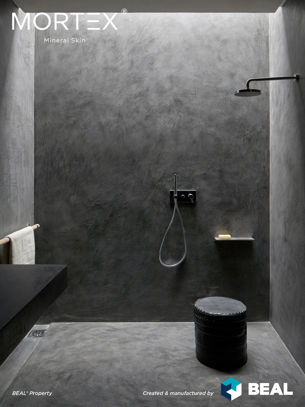 Mortex mineral skin shower application, dark grey finish
