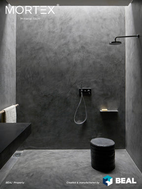 Mortex mineral skin shower application, dark grey finish
