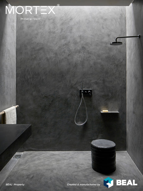 Mortex mineral skin shower application, dark grey finish